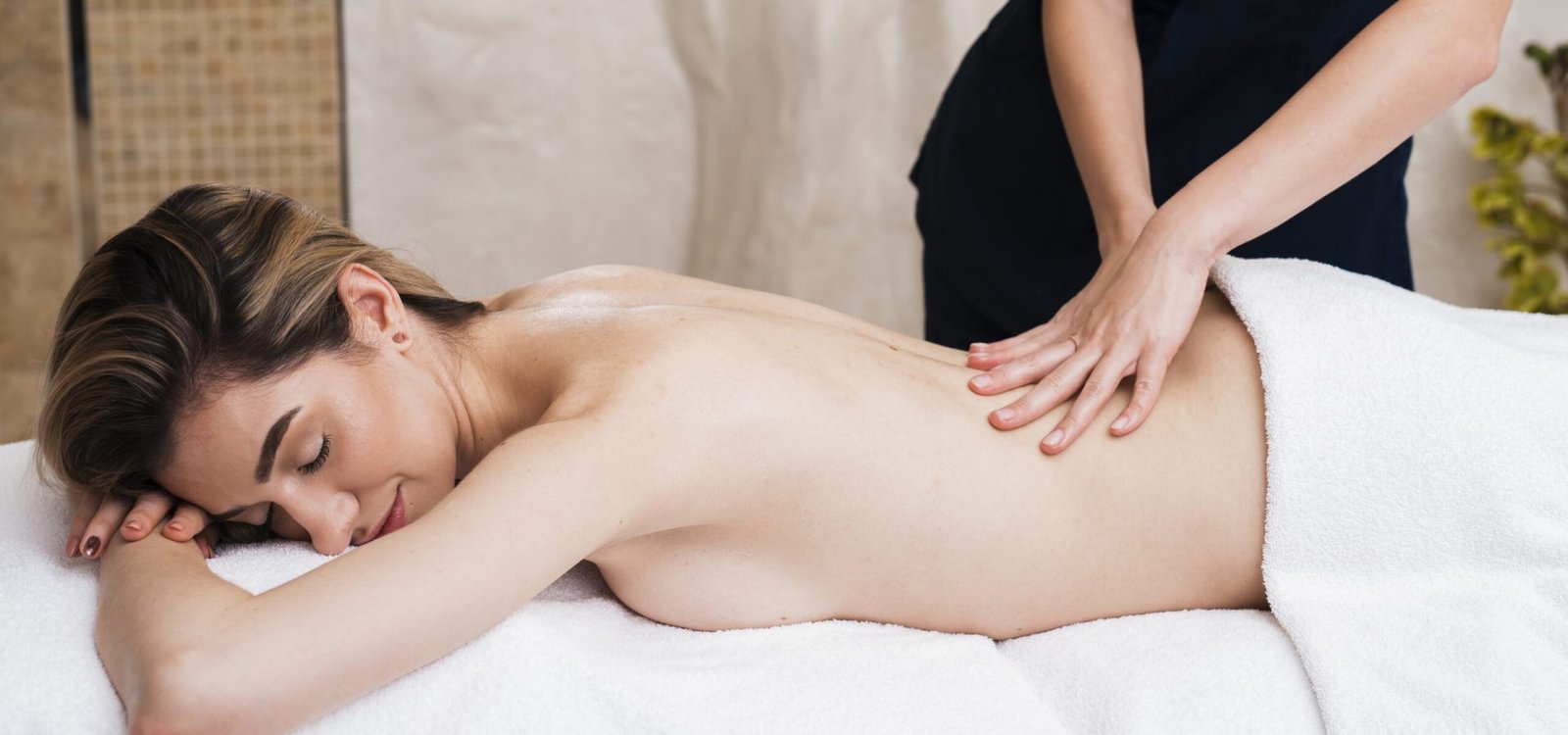 close-up-girl-relaxing-with-massage